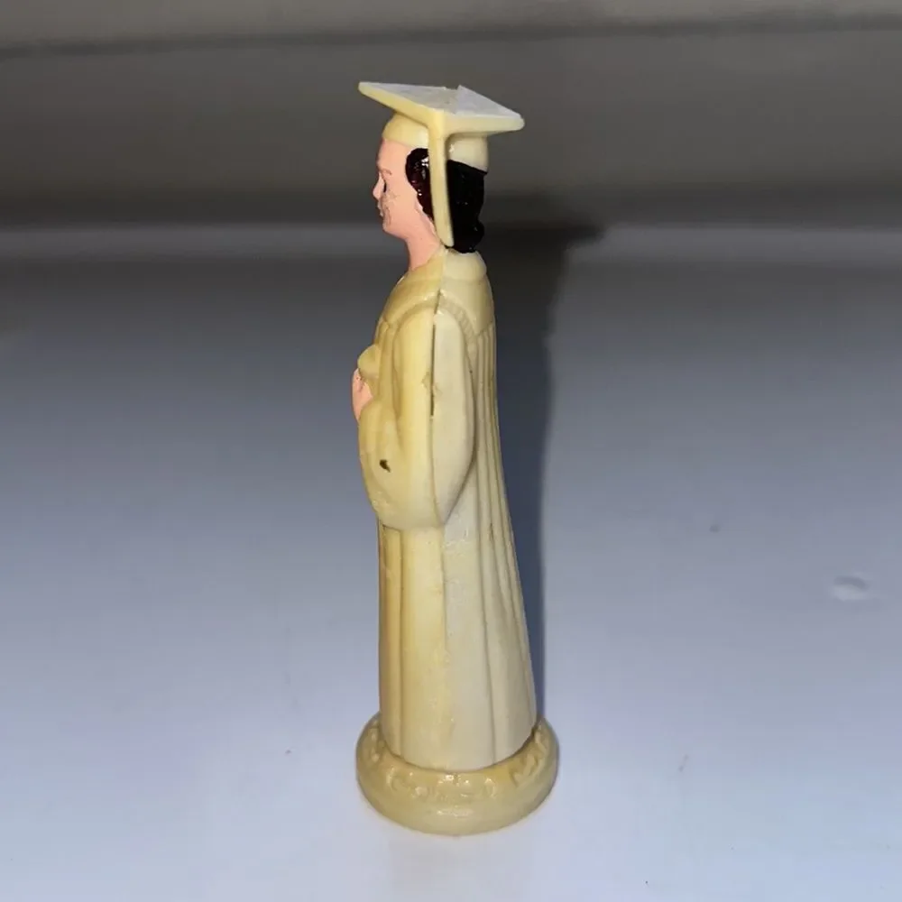 Vintage thin hard plastic‎ female graduate holding diploma cake topper